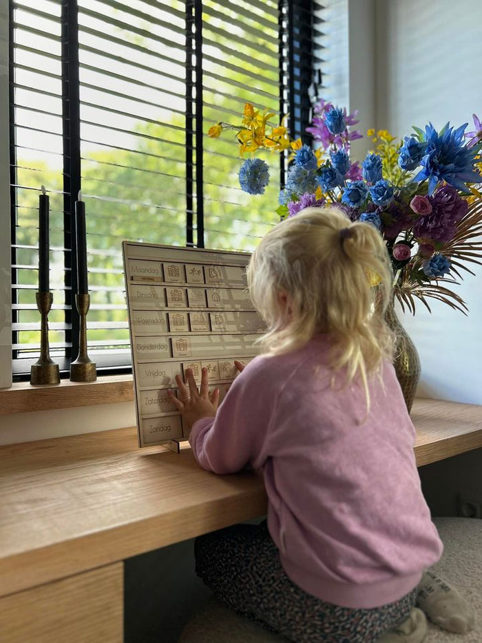 Houten weekplanner met pictogrammen