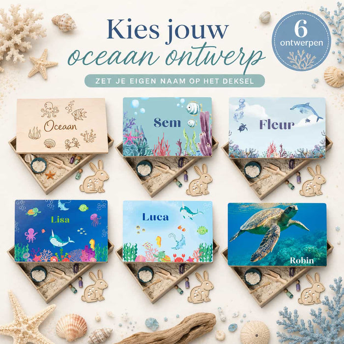 Speelgoed op thema oceaan met zeedieren, schelpen en blauwe speelmaterialen