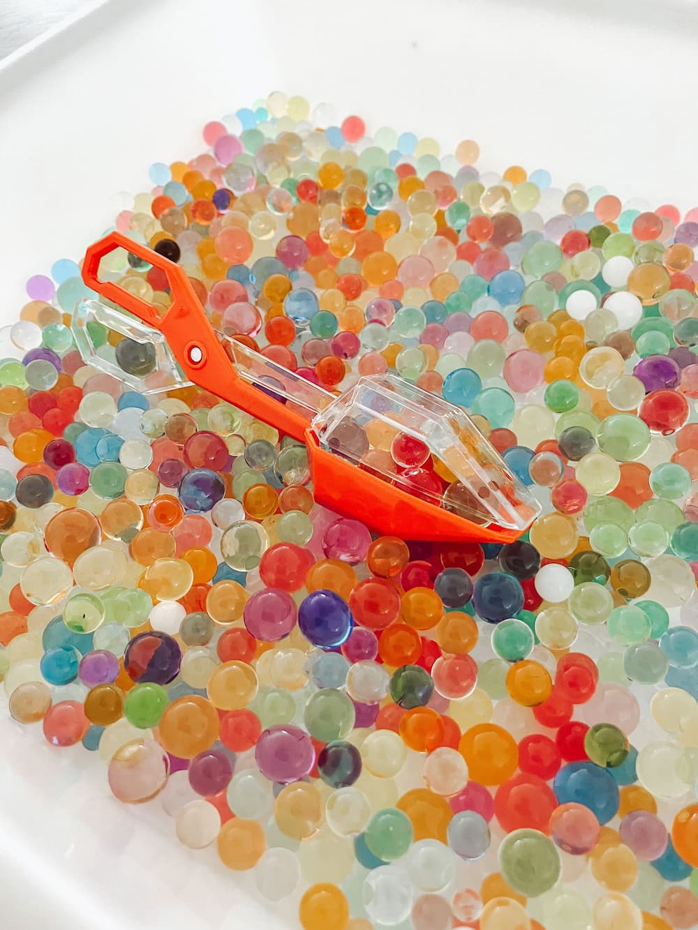 Speelbak M + waterparels + grijper